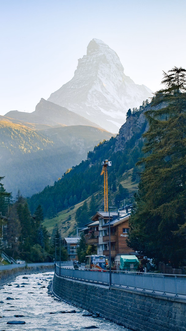 The Matterhorn rises above an alpine landscape.